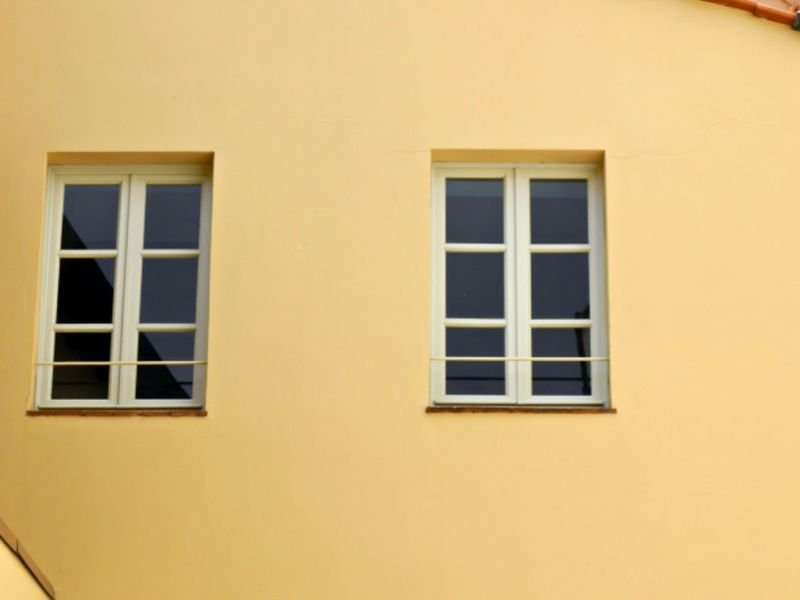 Completed decorative render finish on an externally insulated facade